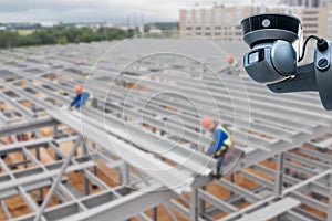 CCTV with Blurring Building construction background.