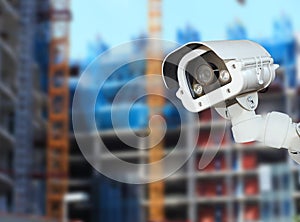 CCTV with Blurring Building construction background.