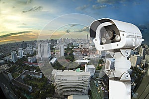 CCTV with Blurring City in background.