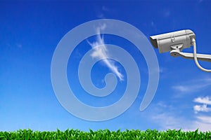 Cctv camera and blue sky.
