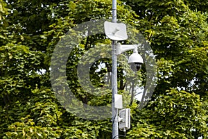CCTV camera on metal pole in public park
