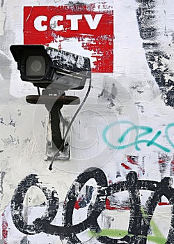 CCTV camera mounted on a Graffiti Tagged wall
