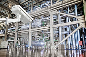 CCTV camera operating inside industrial factory
