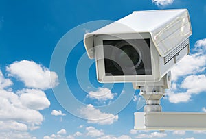 Cctv camera or security camera on blue sky background