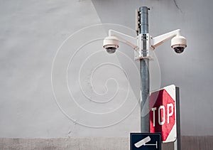 CCTV camera security on the old wall