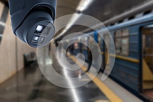 CCTV Camera security operating on subway station platform.underground railways station