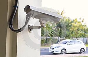 CCTV camera security at outdoor parking lot. With copy space for text or design