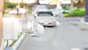 CCTV camera surveillance on car parking Safety system area control with flare light and copy space
