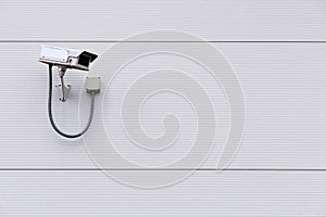 CCTV camera on wall with copy space