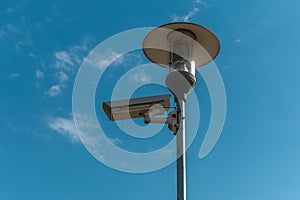 CCTV Cameras against the blue sky. Designed for visual control or automatic image analysis (automatic face recognition).