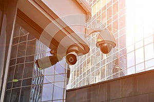 CCTV cameras on the background of the modern city