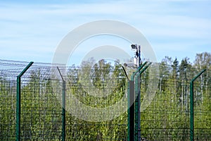 CCTV cameras on the fence