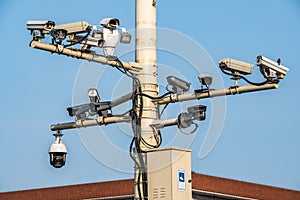 CCTV cameras on lantern pole in the capitol city of china Bejing. Concept of security, surveillance, being watched