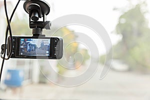 CCTV car camera for safety on the road accident. Video recorder driving a car on highway.A car dash cam mounted on the front winds