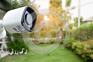 CCTV Closed circuit camera, TV monitoring in garden at home, security system concept