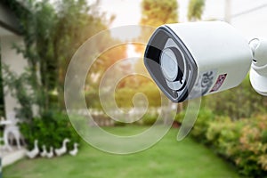 CCTV Closed circuit camera, TV monitoring in garden at home, security system concept