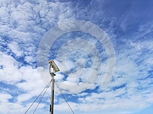 CCTV on cloud and blue sky background.