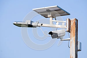 CCTV and illumination with solar panel on the post