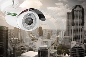 CCTV, security camera on building city.