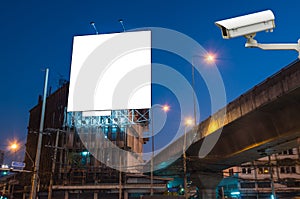 CCTV security camera on monitor the Blank billboard for advertisement at twilight time