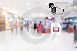 CCTV security with shop store blurry background or backdrop. photo