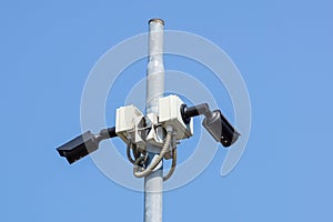 CCTV surveillance security camera vedio equipment in dark tone tower home and house building on wall for safety system