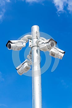 CCTV TV, security camera on blue sky background