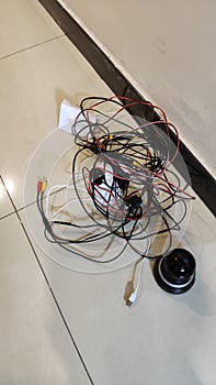 CCTV wire is messed up on the floor