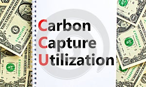 CCU Carbon capture utilization symbol. Concept words CCU Carbon capture utilization on beautiful note. Beautiful dollar background