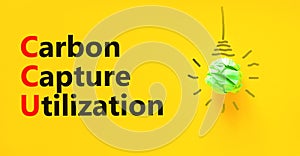 CCU Carbon capture utilization symbol. Concept words CCU Carbon capture utilization on beautiful paper. Beautiful yellow