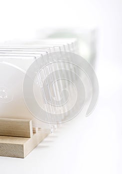 A CD cases standing on CD rack. Conceptual image