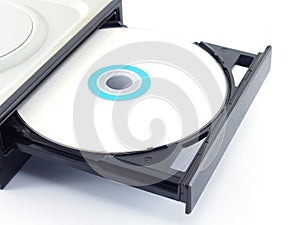 close-up white Cd or Dvd disc in opened tray on white background