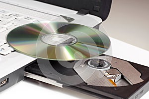 CD/DVD and laptop.