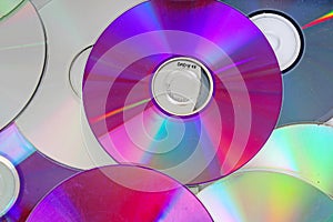 Cd,dvd reflective shiny cd dvds background texture pattern.