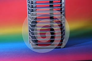 CD numbered storage rack on a colorful background with gradient