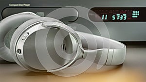 CD player and headphones for listening to music, close-up.