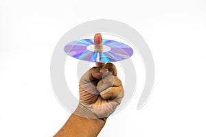 CD-ROM disc with rainbow reflective light on man hand isolated