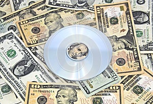 Cd-rom on pile of cash photo