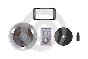 CD, USB flash drive, old tape, mobile on white isolated background