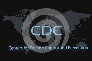 CDC inscription on a dark background and a world map photo