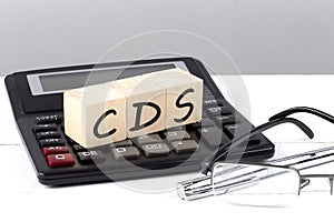 PAY IT FORWARD text on a paper on chart background