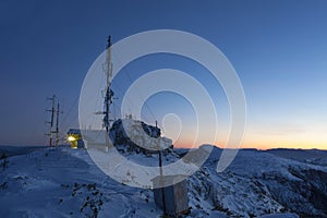 Ceahlau Toaca weather station in winter photo