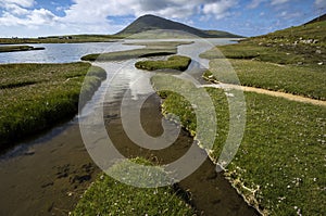 Ceapabhal hill and tidal inlets or saltings at An Taobh Tuath or Northton on the Isle of Harris, Scotland. photo