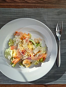 Ceasar salad with prosciutto. Top view. Vertical