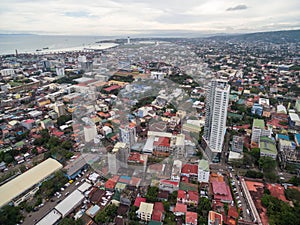 Cebu City Cityscape with Skyscraper and Local Architecture. Province of the Philippines located in the Central Visayas. Ocean in B