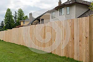 Cedar Wood Fencing along Home Backyard