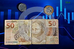 Cedula de 50 reais brazilian money on a graph the image of the jaguar facing the efinge photo