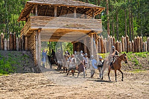 Chieftain on the horse leading his warriors to battle