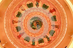Ceiling artwork of Lord Krishna and Radha.