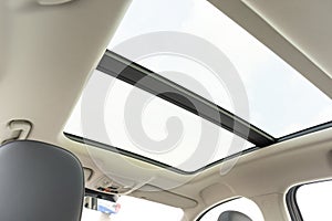 ceiling of the car with a transparent glass hatch for airing.